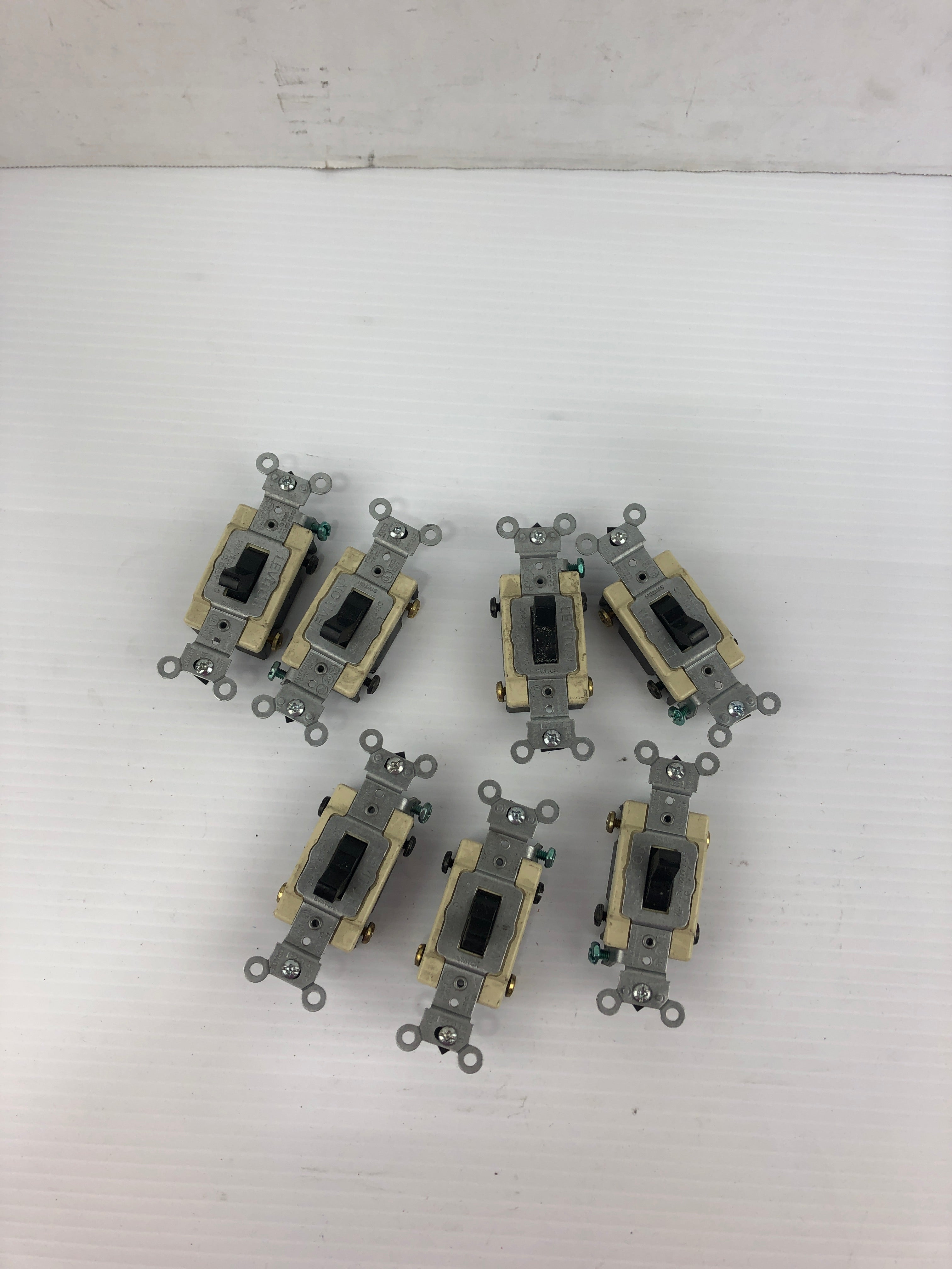 Leviton 1132E1 Ivory and Black Outlet Switch - Lot of 7