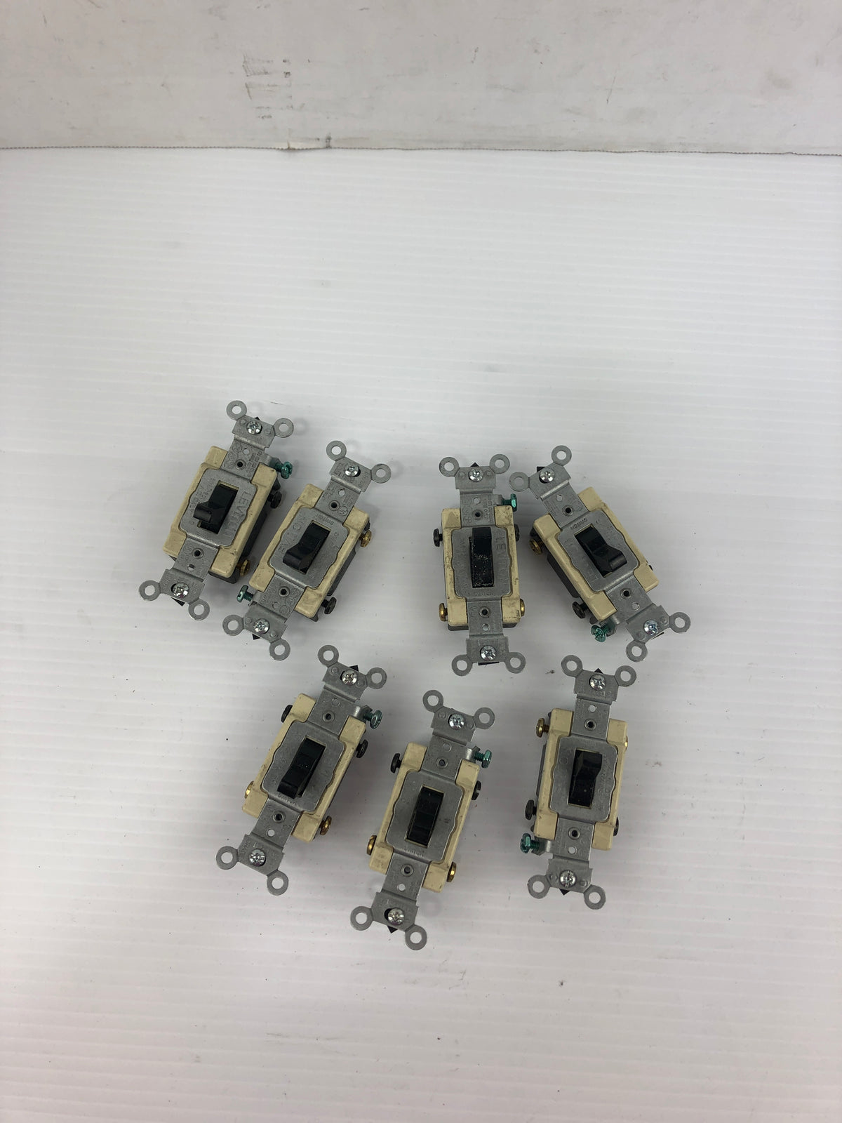 Leviton 1132E1 Ivory and Black Outlet Switch - Lot of 7