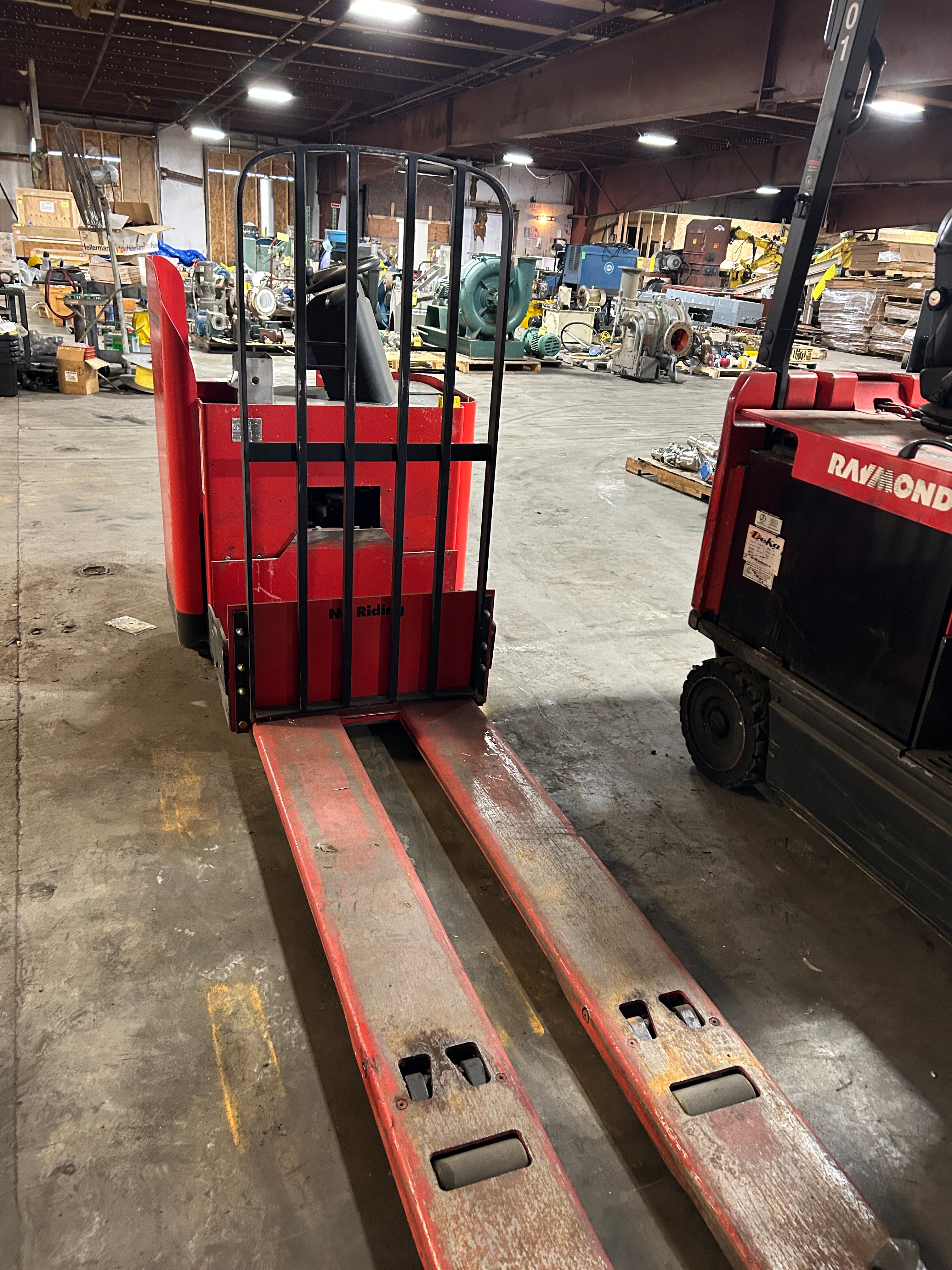 Raymond 19-F80L Electric Pallet Jack Stand-Up Rider Long Forks 8000 Lb. 24V