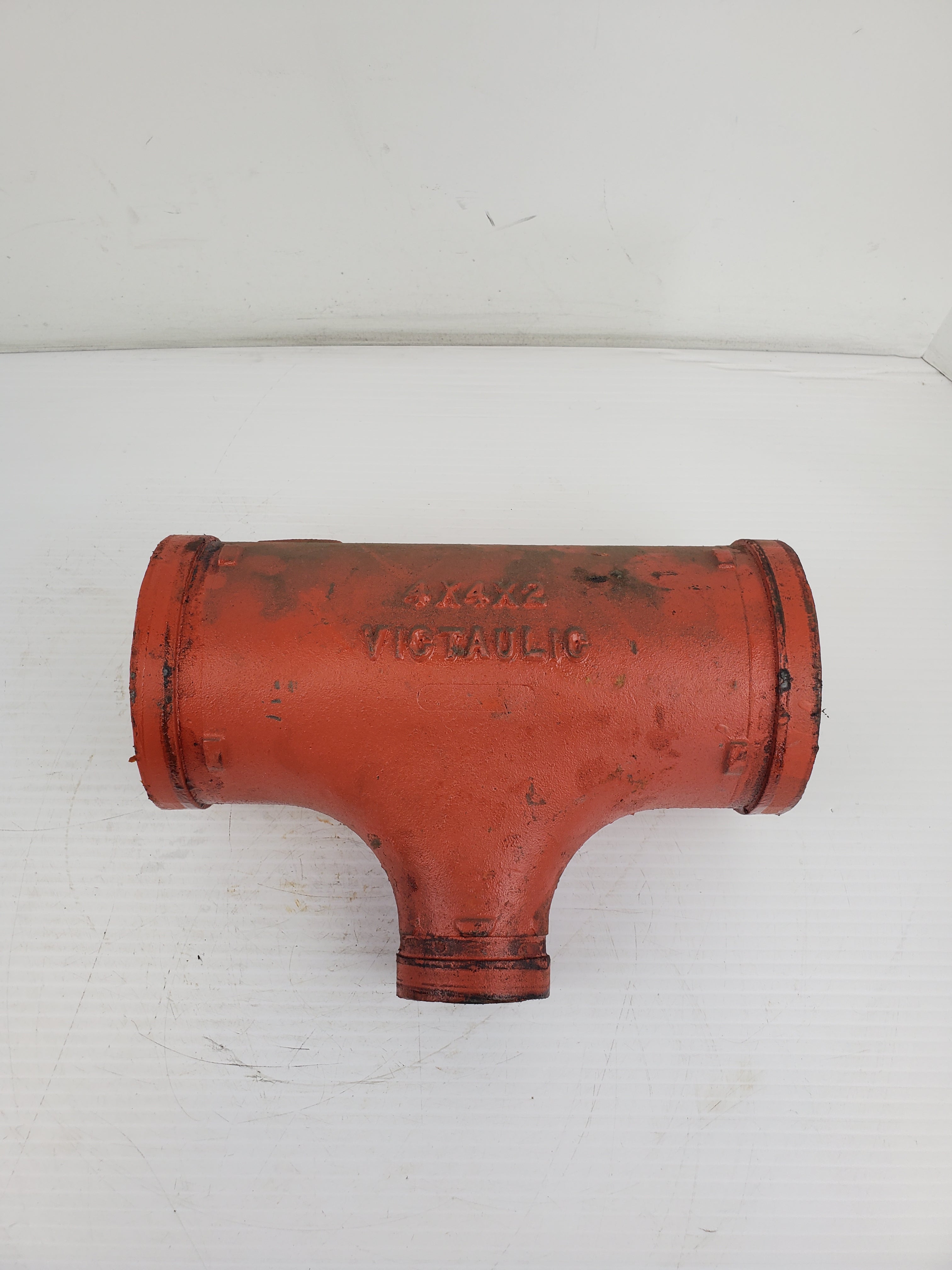 Victaulic #25 4" x 4" x 2" Reducing Tee Fitting