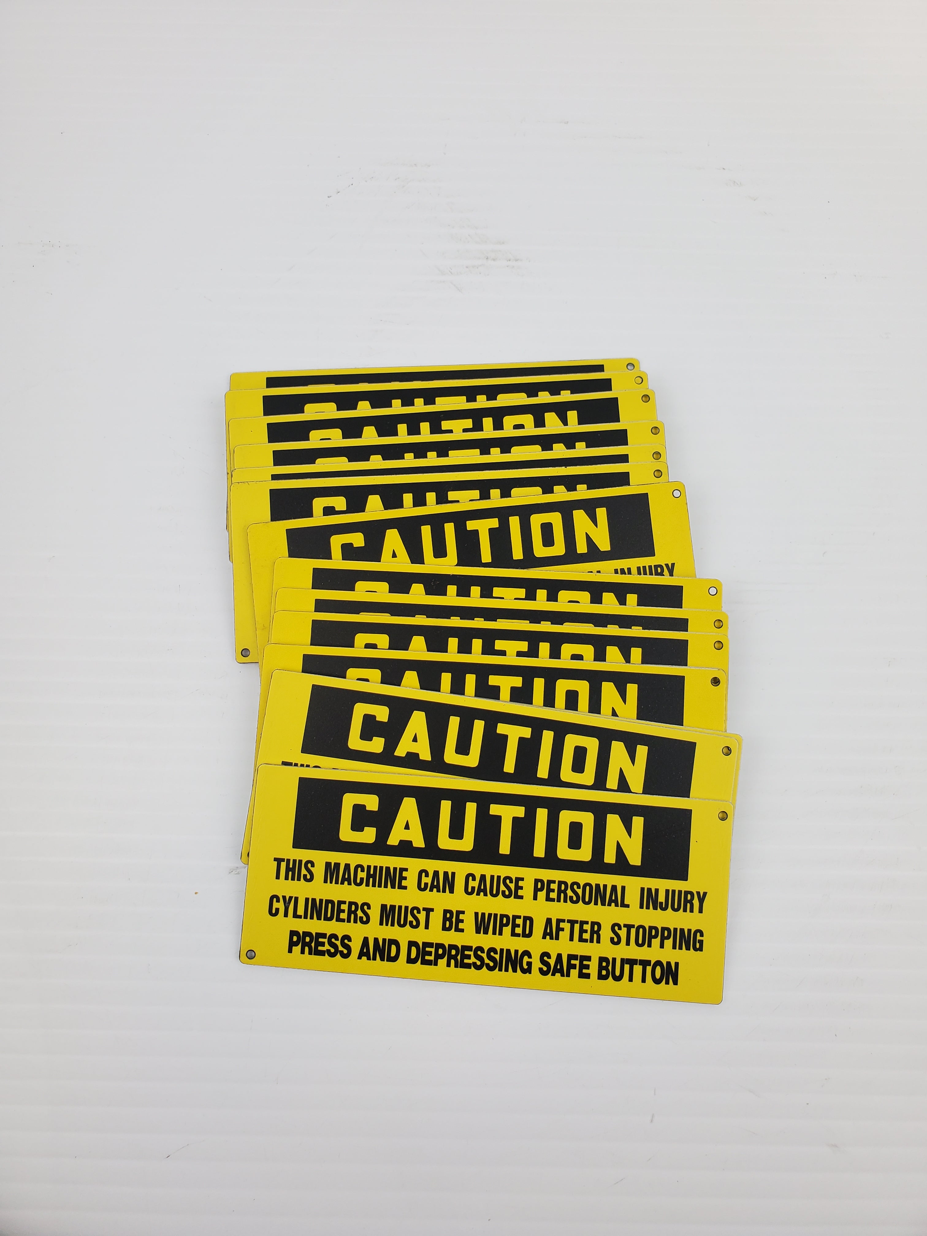 Caution Yellow Metal Adhesive Sign 5"L x 2"W (Lot of 15)