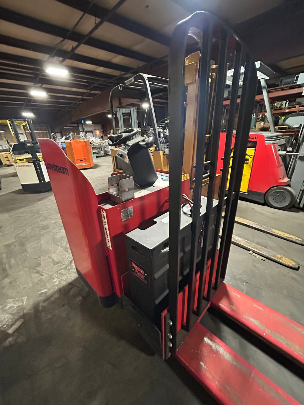 Raymond Rideable Jack Raymond 19-F80L Electric Pallet Jack Stand-Up Rider Long Forks 8000 Lb. 24V