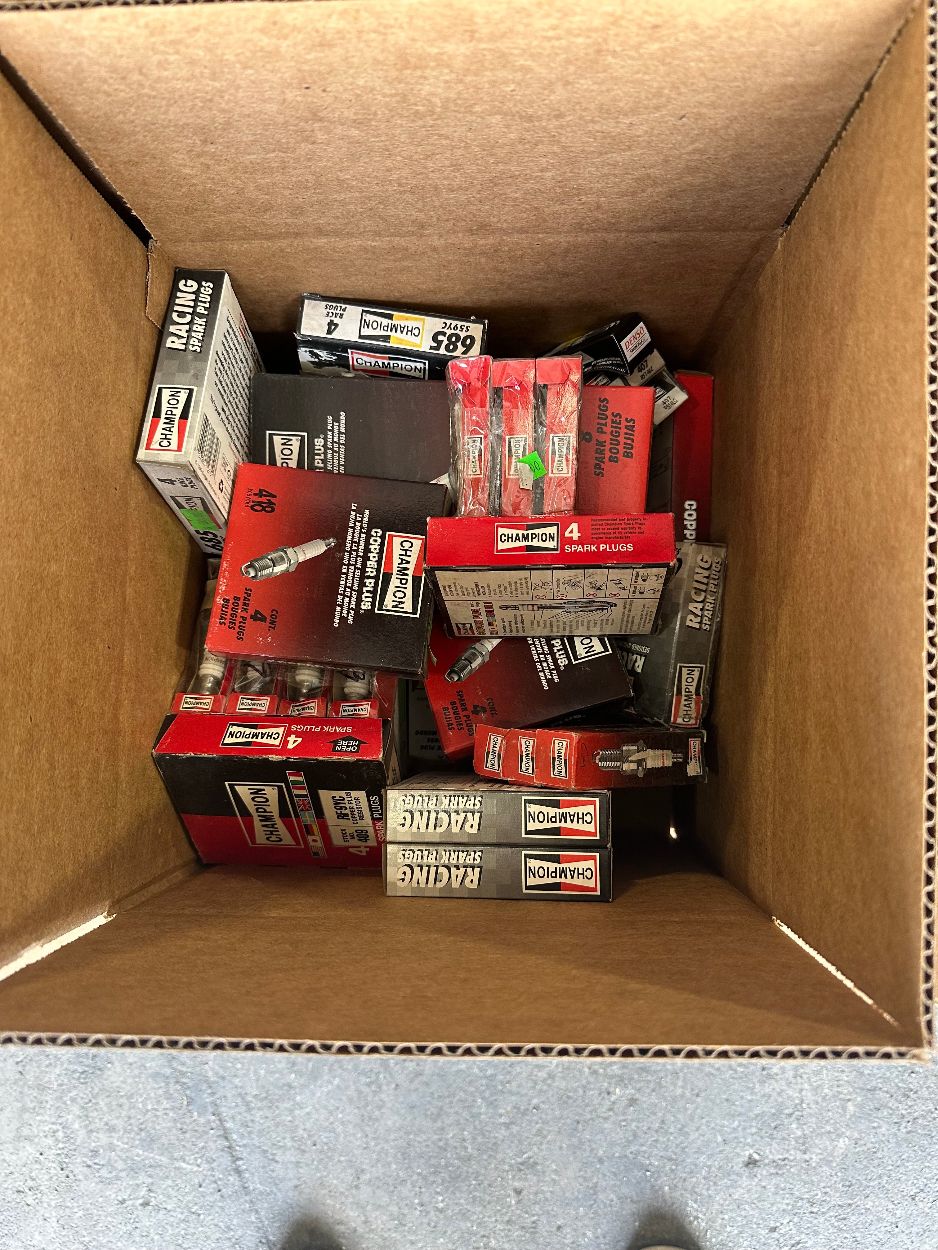 Huge Lot of Automotive Spark Plugs Champion, AC Delco, Autolite, Denso