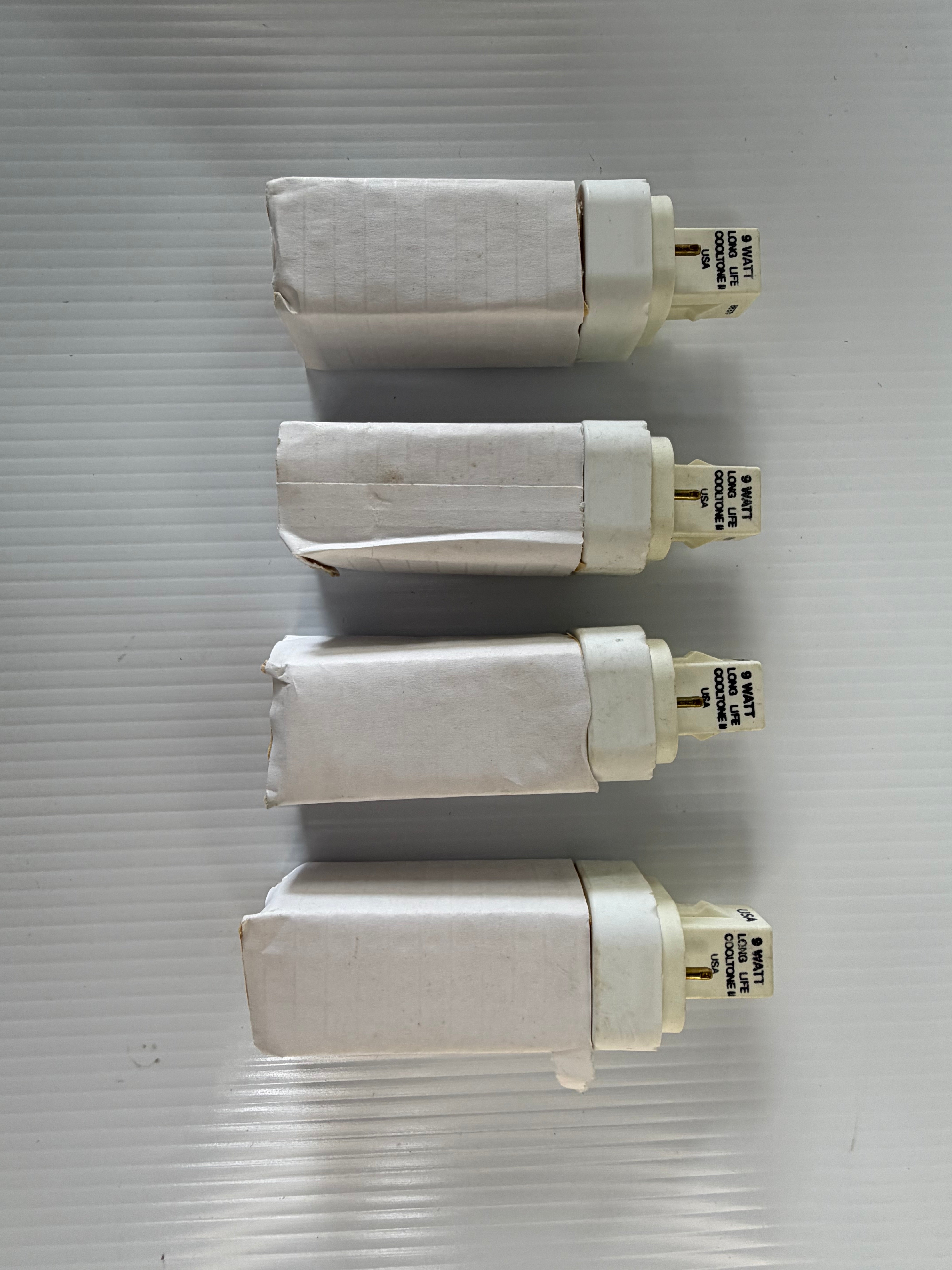 Lot of 4 9 Watt Cooltone Long Life Bulbs