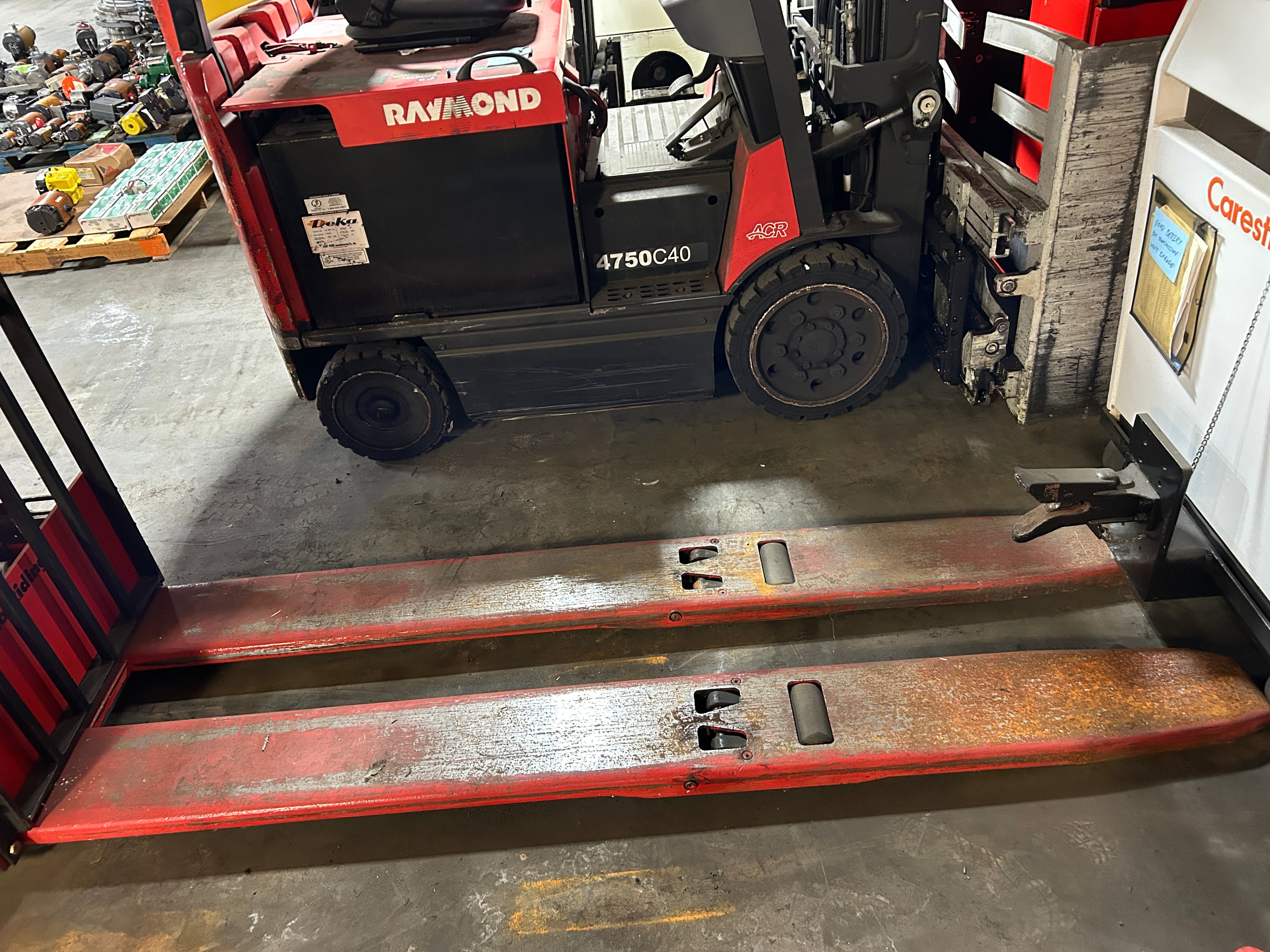 Raymond 19-F80L Electric Pallet Jack Stand-Up Rider Long Forks 8000 Lb. 24V