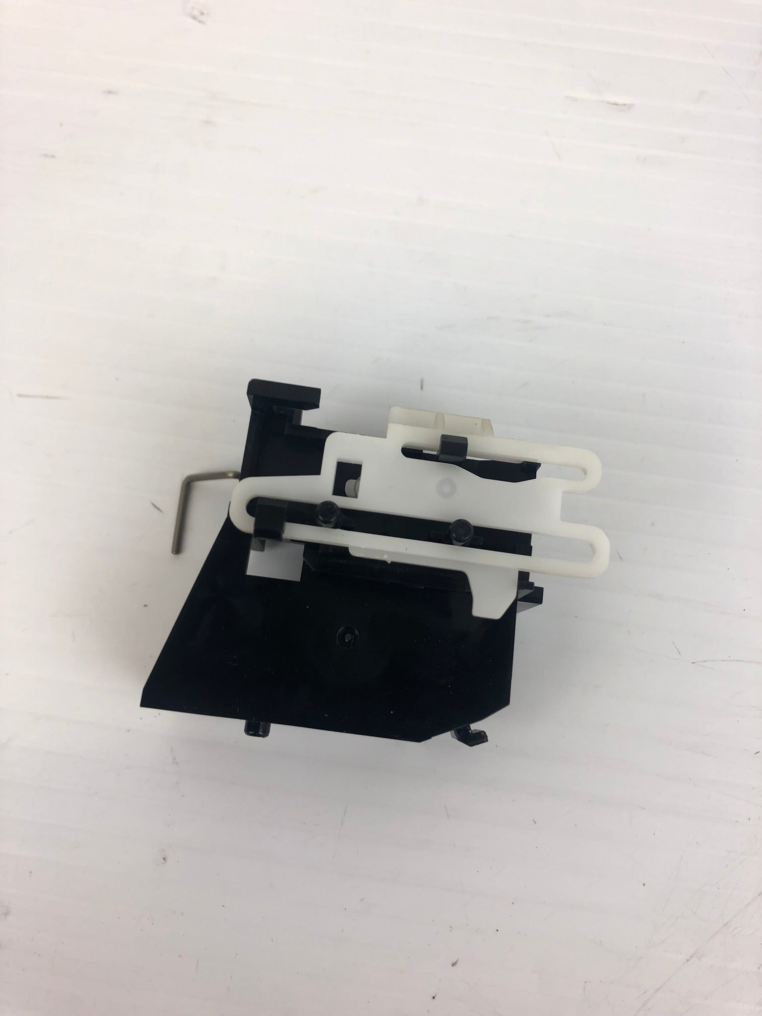 HP RC2-2713 Right Stopper Assembly A24 - Pulled from Laser Jet Printer 600 M601